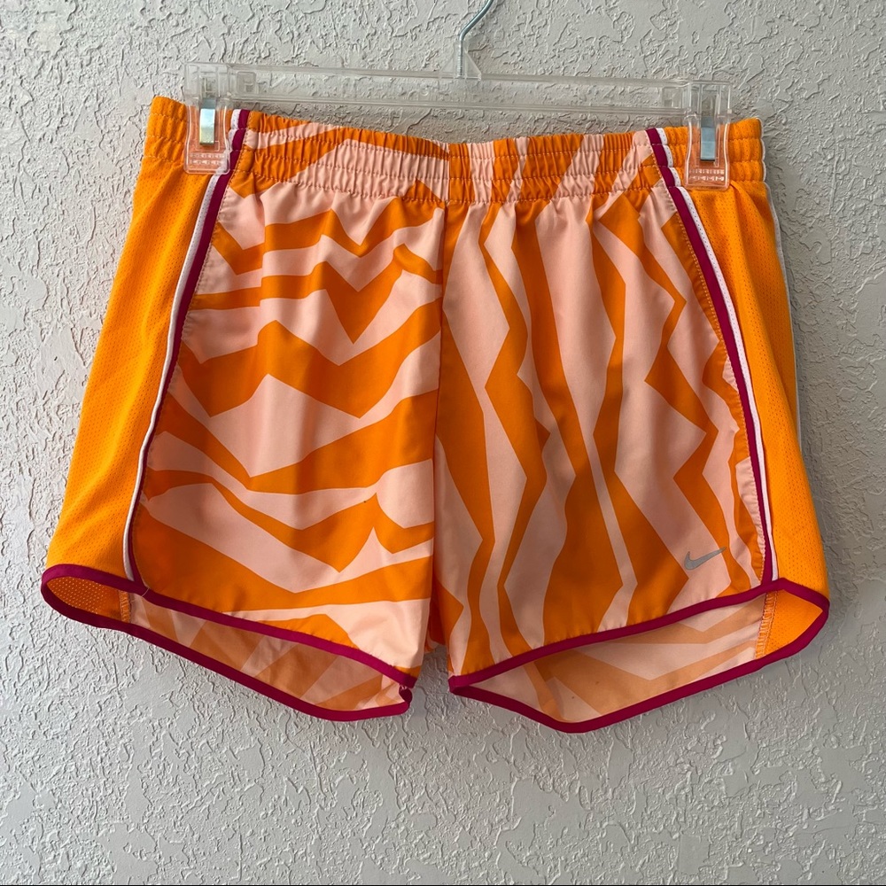 Nike women’s Dri- fit vented running shorts, small, orange